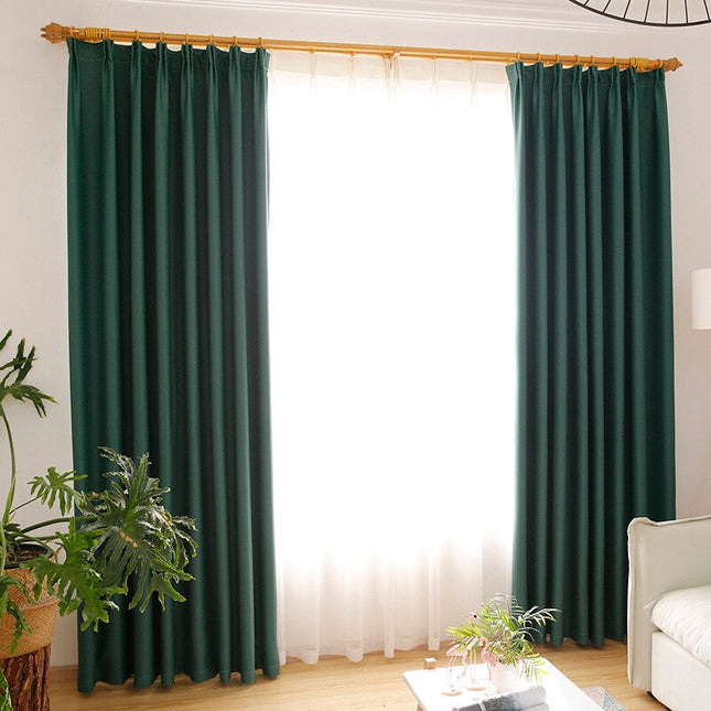 Donkergroen verduisterend gordijn voor woonkamer