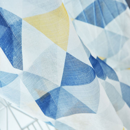 Vitrage met blauw geel geometrisch patroon