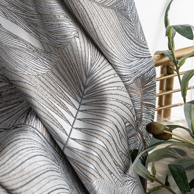 Verduisterend gordijn Nirboa met bladeren patroon.