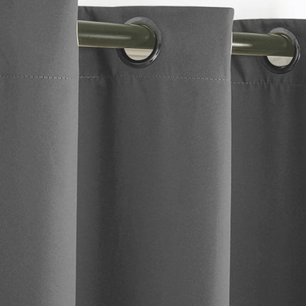 Zonwerend buitengordijn met ringen terras