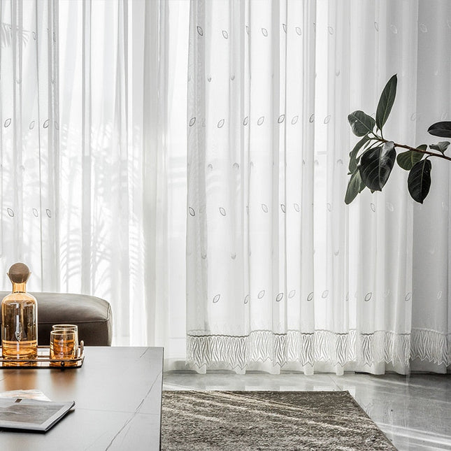 Lichtdoorlatend gordijn met franjes onderaan