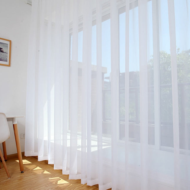 Lichtdoorlatend wit glasgordijn voor woonkamer