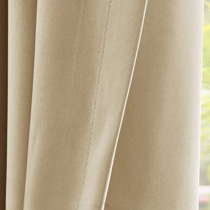 Verduisterend buitengordijn voor pergola met ringen.