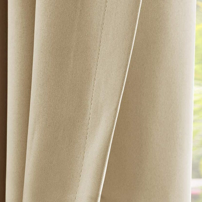 Verduisterend buitengordijn voor pergola met ringen.