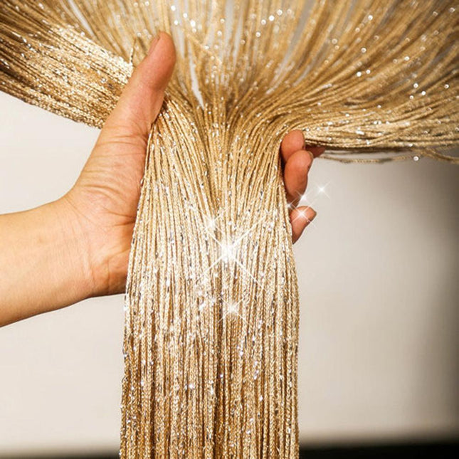 Goudkleurig draadjesgordijn met glitters