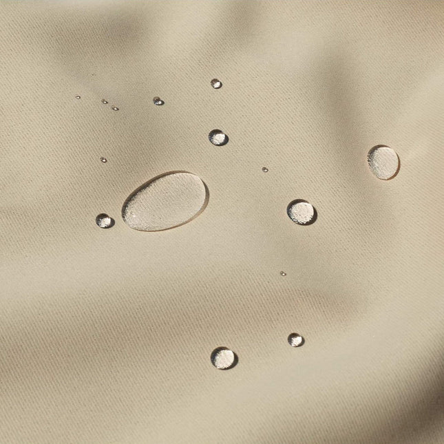 Isolerend serre gordijn met ringen boven.