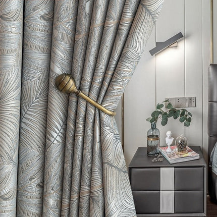 Verduisterend gordijn Nirboa met bladeren patroon.