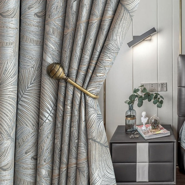 Verduisterend gordijn Nirboa met bladeren patroon.