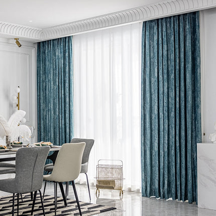 Verduisterend gordijn van blauw chenille
