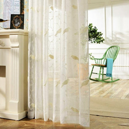 Landelijke vitrage met vogels op takken