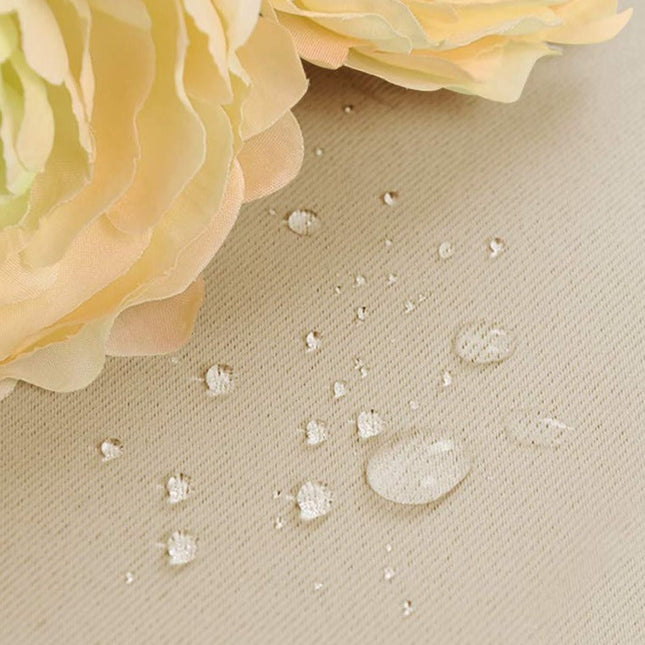 Beige buitengordijn met tunnel voor roede