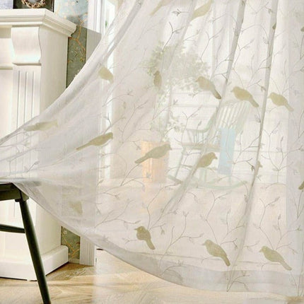 Landelijke vitrage met vogels op takken