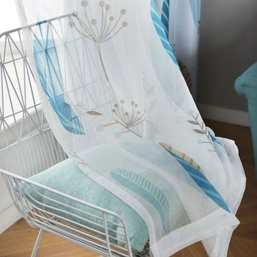 Blauw vitrage gordijn met bloemenmotief