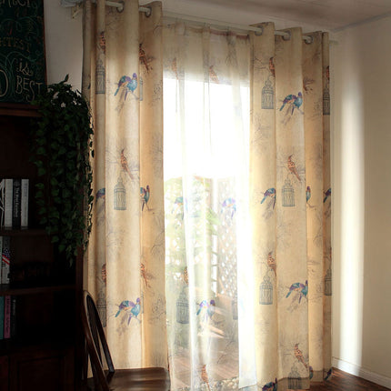 Paars gordijn met vogel- en kooiprint