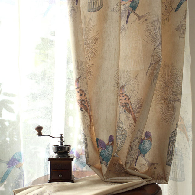 Paars gordijn met vogel- en kooiprint