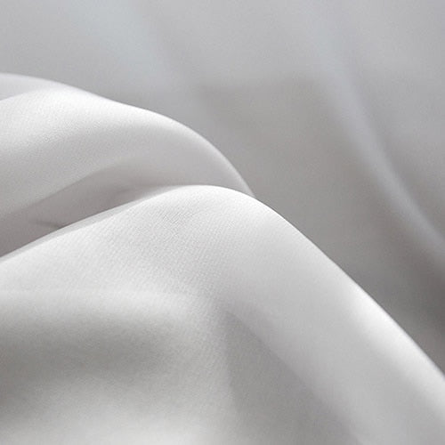 Effen soepelvallend lichtdoorlatend gordijn