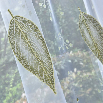 Vitrage gordijn met groene bladeren