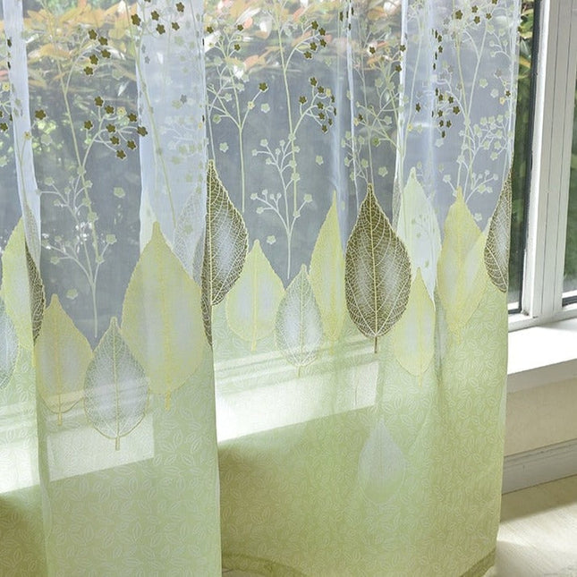 Vitrage gordijn met groene bladeren