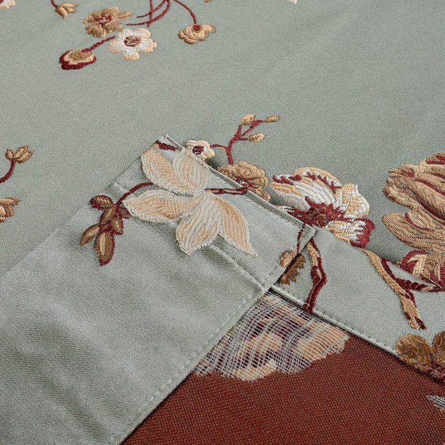 Satijnen verduisterend gordijn Ocreza met bloemen.