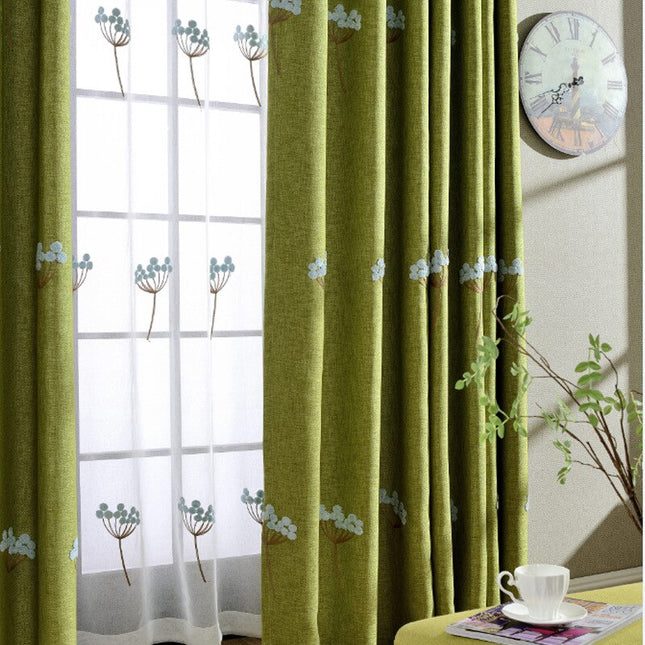 Geborduurde vitrage met lichtblauwe bloemen