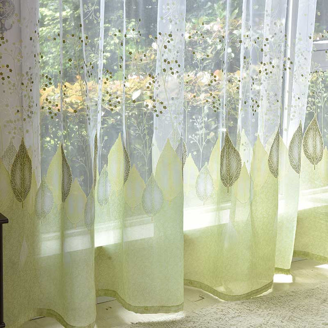 Vitrage gordijn met groene bladeren