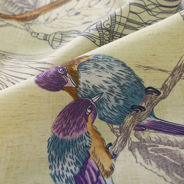 Paars gordijn met vogel- en kooiprint