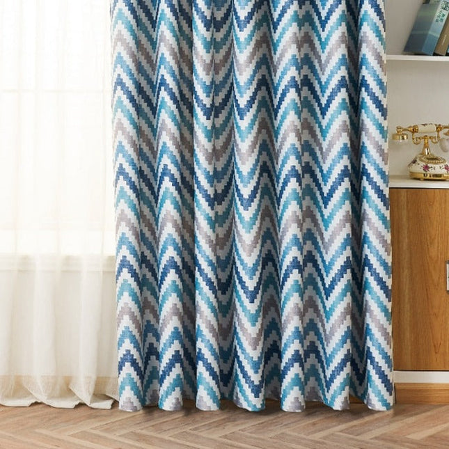 Blauw verduisteringsgordijn met modern zigzagpatroon