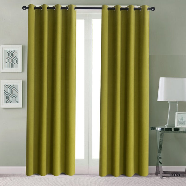 Effen groen gordijn met ringen