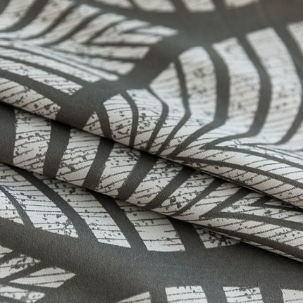 Verduisterend gordijn met modern bladmotief