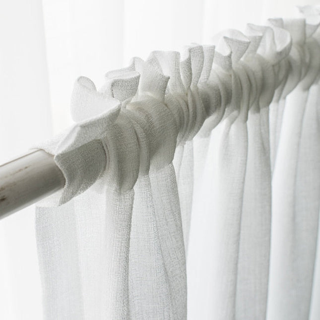 Witte vitrage met fijne structuur