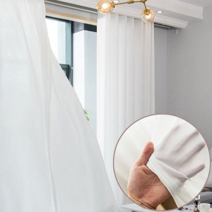 Lichtdoorlatende witte vitrage op maat