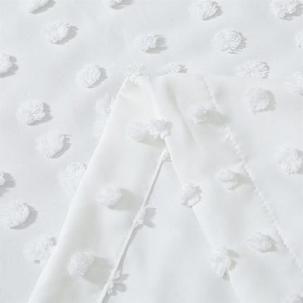 Witte vitrage met getufte stippen