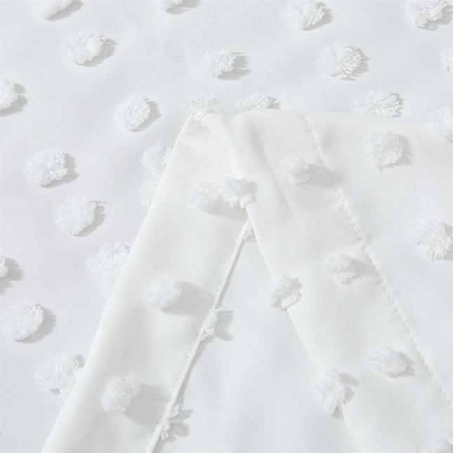 Witte vitrage met getufte stippen