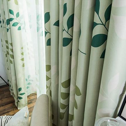 Groen gordijn met modern bladmotief
