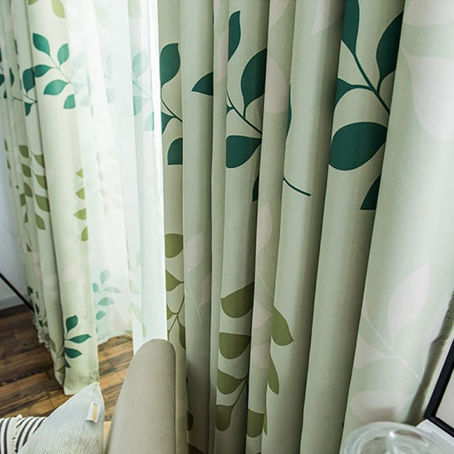 Groen gordijn met modern bladmotief