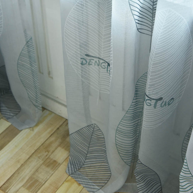 Moderne vitrage met groot bladmotief