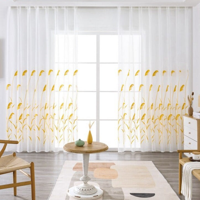 Vitrage met geborduurde gele rietpluimen