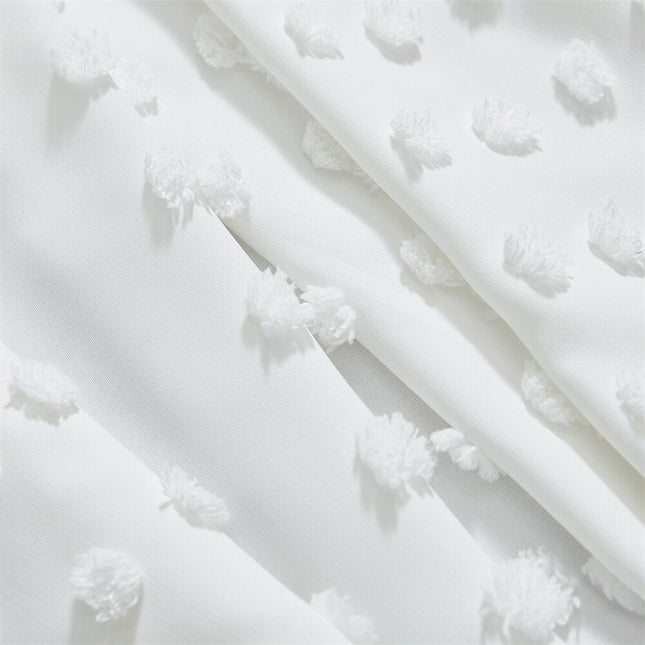 Witte vitrage met getufte stippen