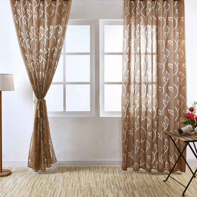 Witte vitrage met ingeweven bladmotief