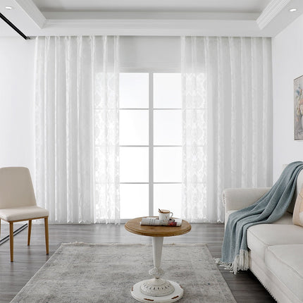 Lichtdoorlatende vitrage met damast patroon