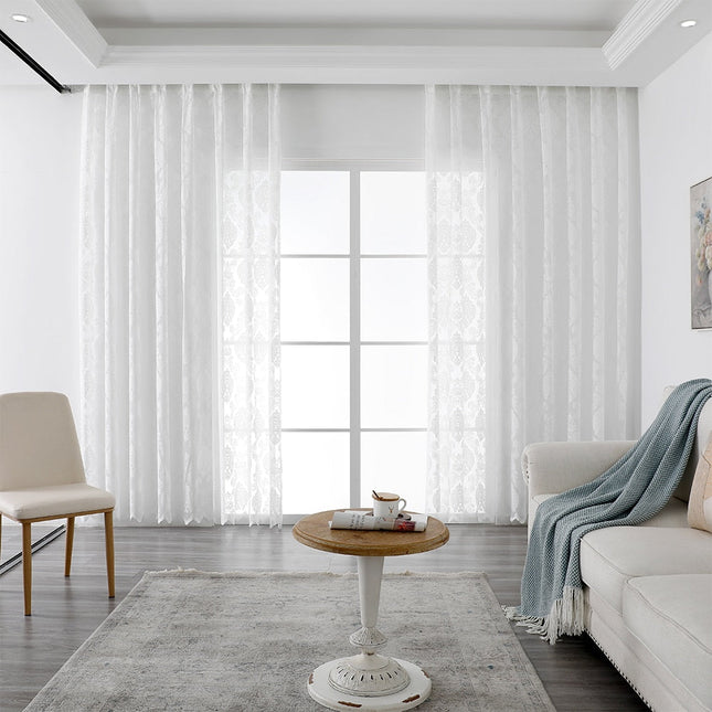 Lichtdoorlatende vitrage met damast patroon