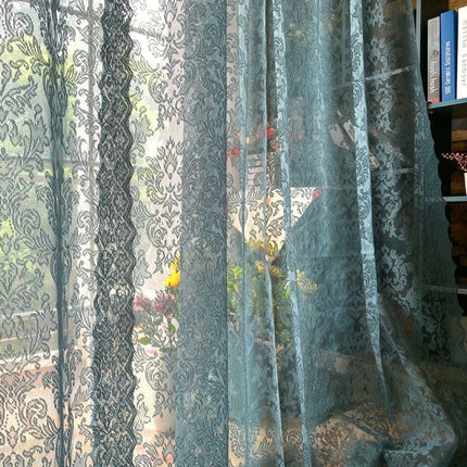 Blauwe kanten vitrage in barokstijl