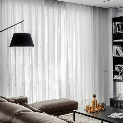 Lichtdoorlatend gordijn met franjes onderaan