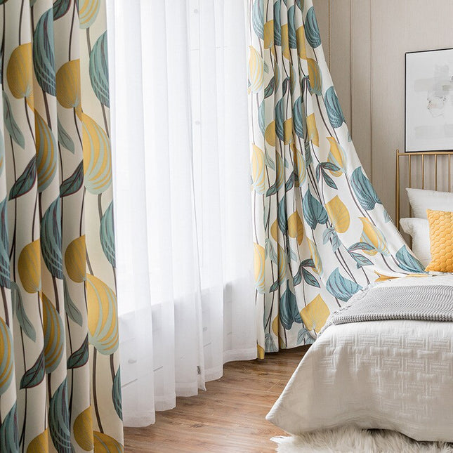 Lichtdoorlatend gordijn met Scandinavisch bladmotief.