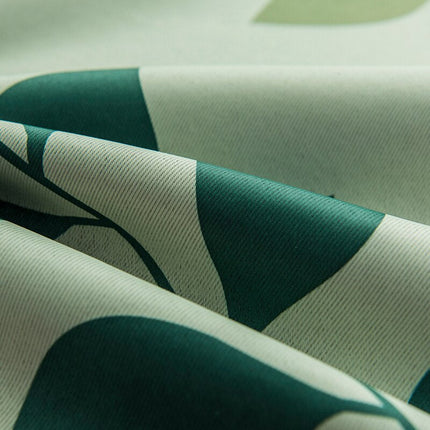 Groen gordijn met modern bladmotief