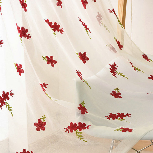 Vitrage met geborduurde rode bloemen
