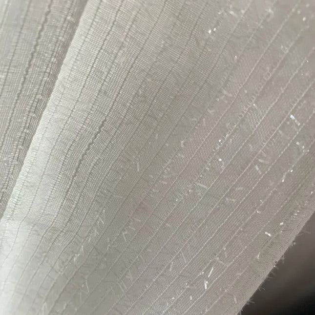 Lichtdoorlatend gordijn met subtiele glitter