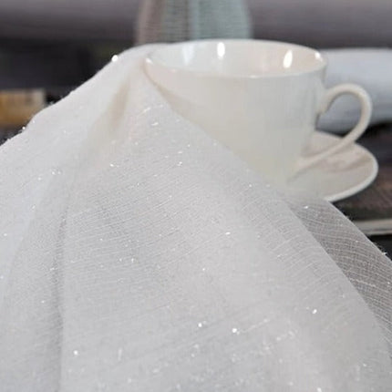 Lichtdoorlatend gordijn met subtiele glitter