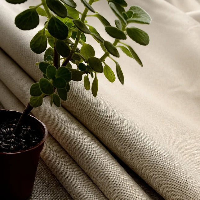 Effen beige verduisterend gordijn