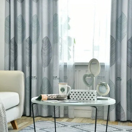 Moderne vitrage met groot bladmotief